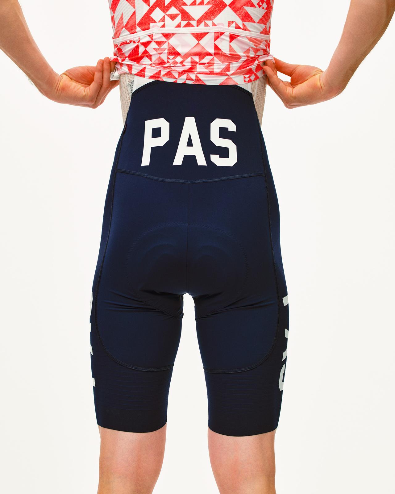 Men’s PAS Mechanism Pro Bibs in navy styled with a matching cycling jersey.