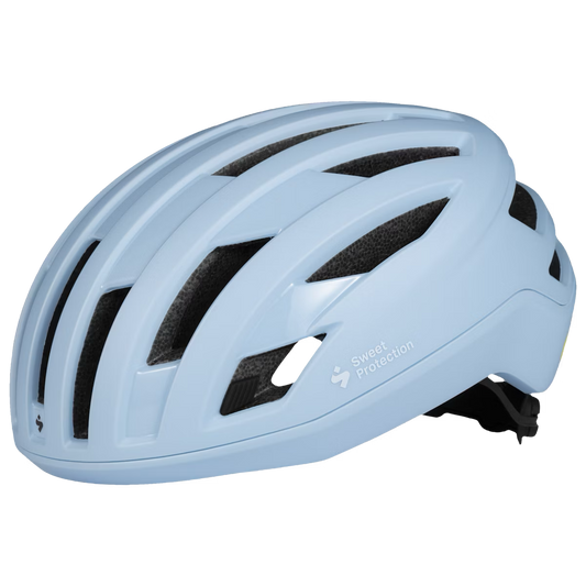 A light blue Fluxer MIPS helmet designed for cycling, featuring ventilation holes and a sleek shape.