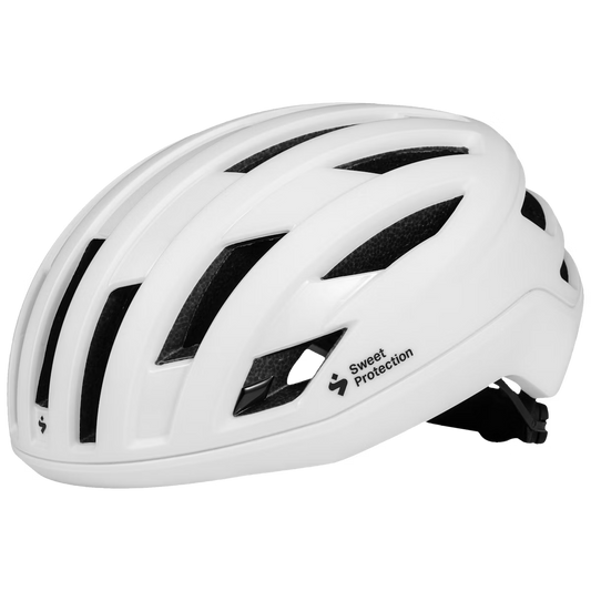 A white Sweet Protection Fluxer MIPS helmet designed for cycling, featuring ventilation holes and a sleek design.