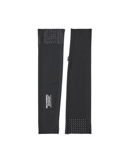 Black arm sleeves with textured ends on a white background