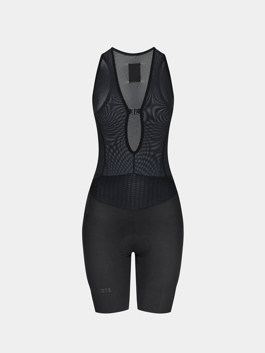 A woman's sleeveless cycling bib shorts in black color with a patterned design on the upper part
