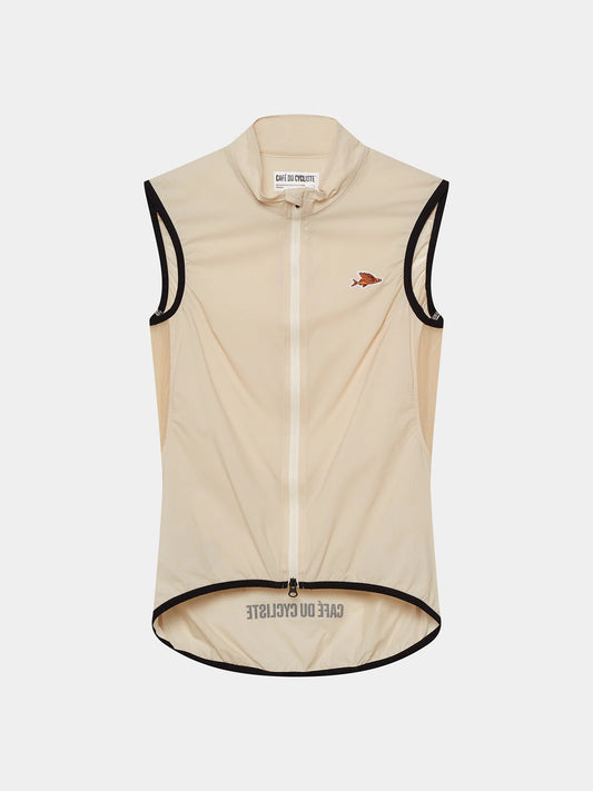 A women's sleeveless cycling gilet in chalk color with a YKK two-way zip and reflective details.