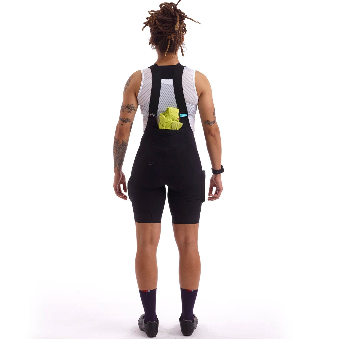 Functional bib shorts with one large rear pocket and two stealth cargo pockets for essential storage.