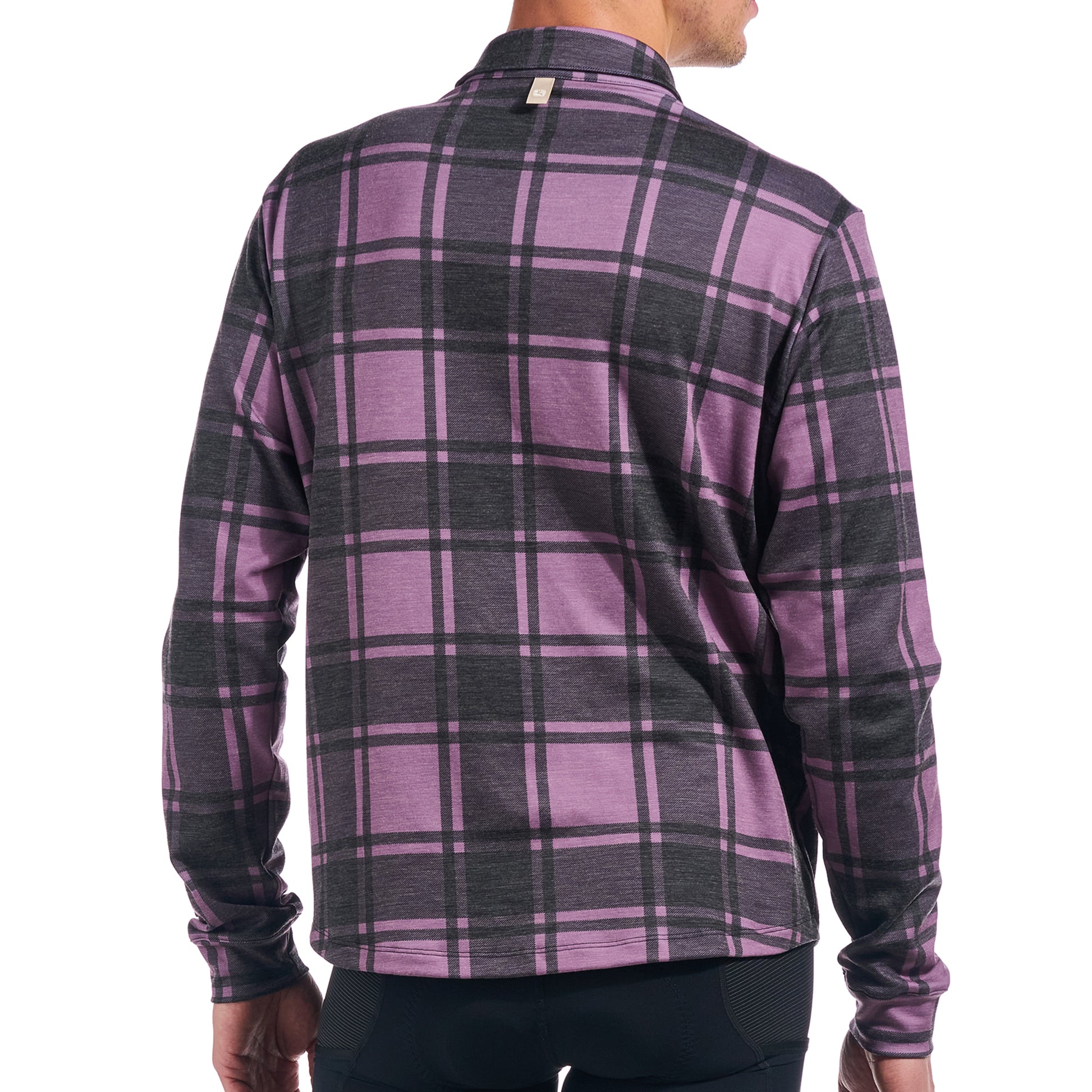 Features a collared neckline and chest pocket for added functionality and style.