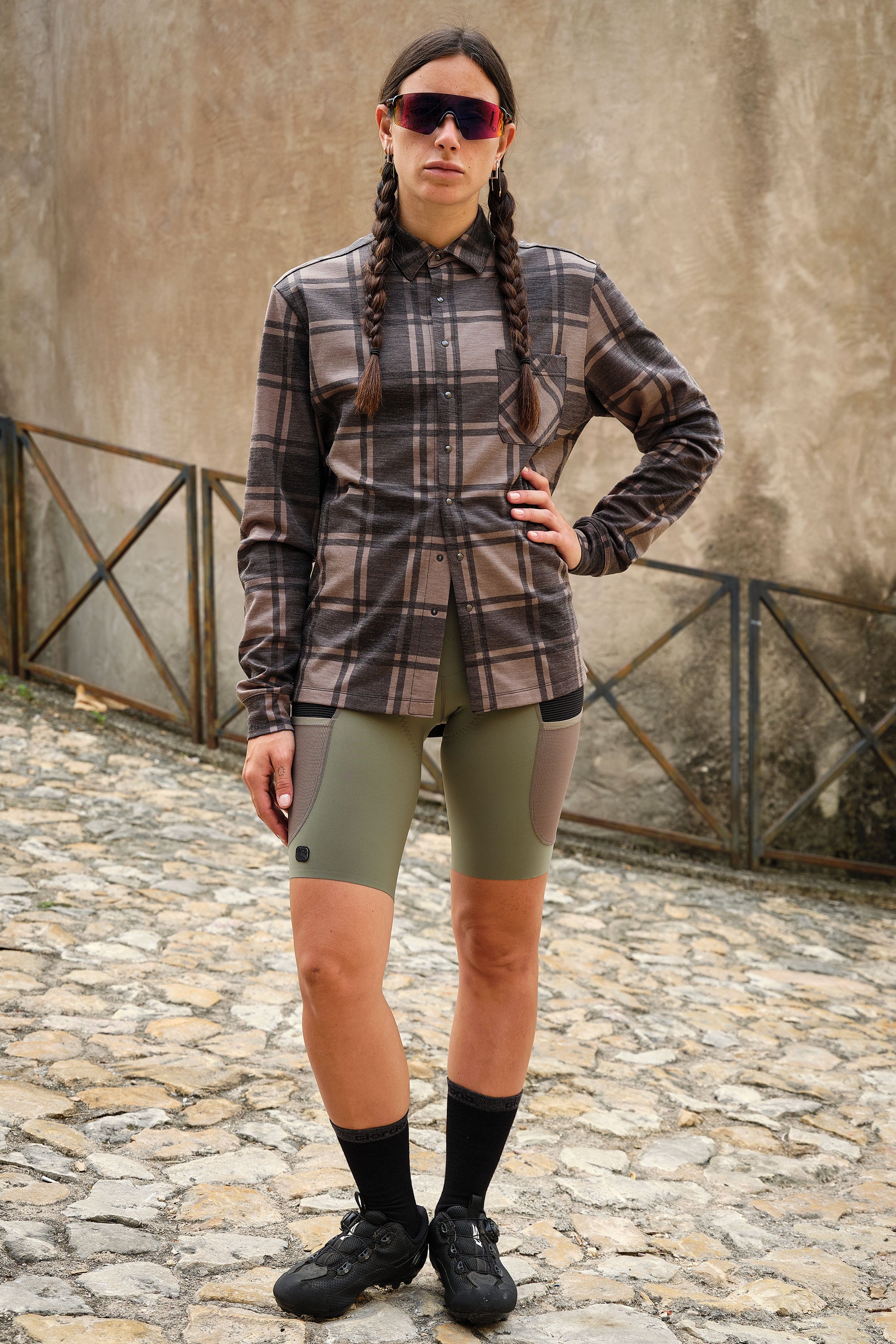 Olive plaid pattern offers a stylish touch to outdoor apparel, suitable for any adventure.
