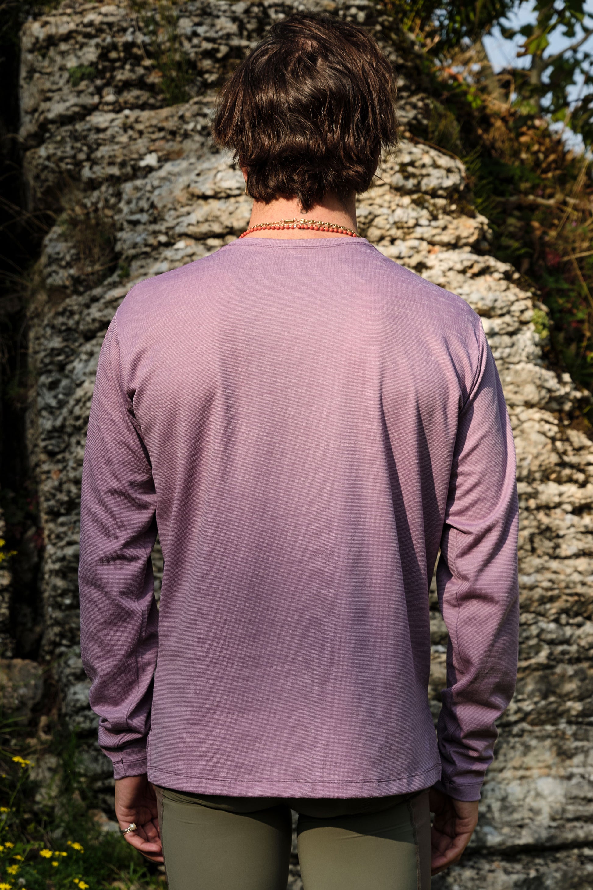 Grapeade long sleeve tee designed with thermal properties for warmth during cool rides.