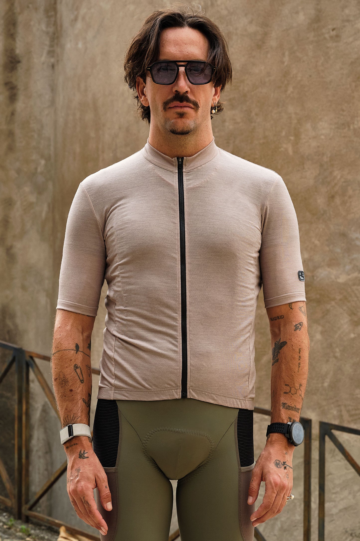 Merino wool blend fabric provides excellent temperature regulation for year-round wear.