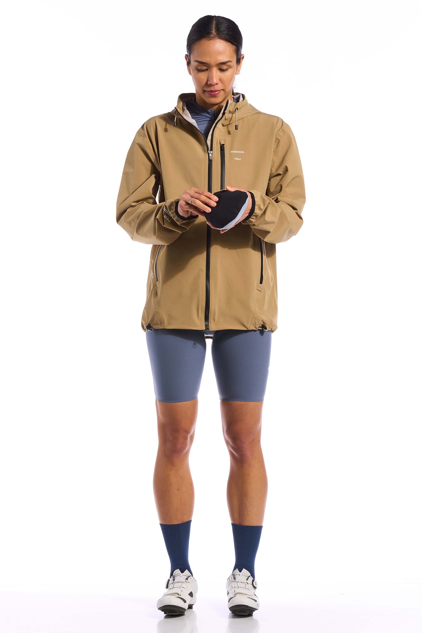 Image of the collaborative branding featured on the Jetty Rain Jacket, representing the partnership between Giordana and Kristopher Brock, available on Cassiopeia US.