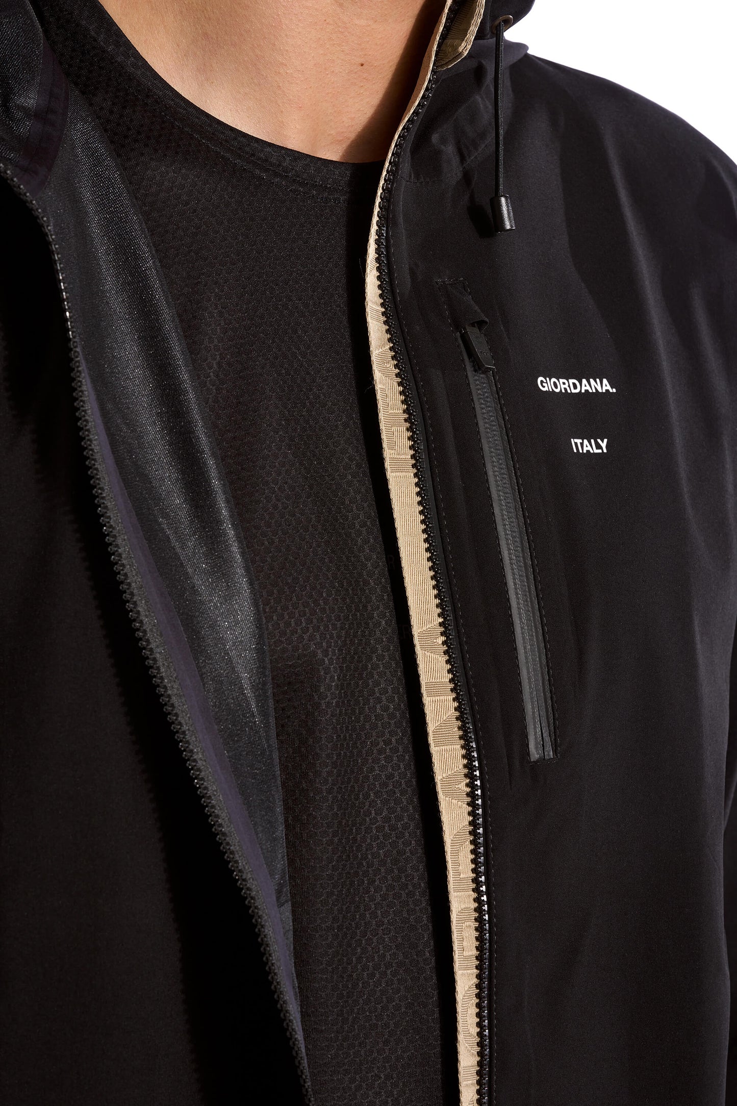Image of the versatile Meteorite Black Jetty Rain Jacket, perfect for embracing the elements while maintaining a stylish appearance during your rides, available on Cassiopeia US.