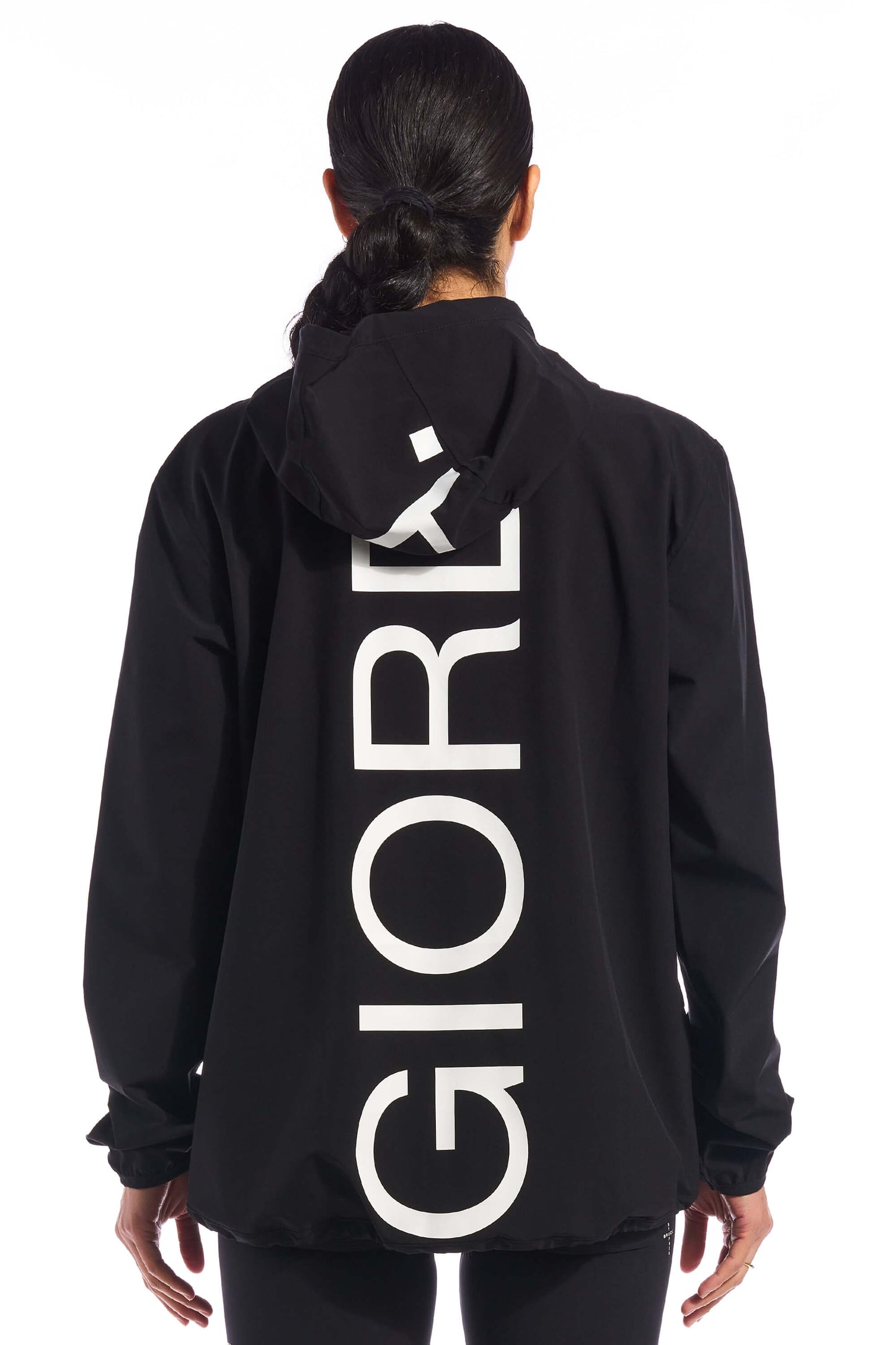 Image showcasing the three-layer waterproof fabric of the Jetty Rain Jacket, providing optimal protection against rain and wind while maintaining a sporty aesthetic, available on Cassiopeia US.