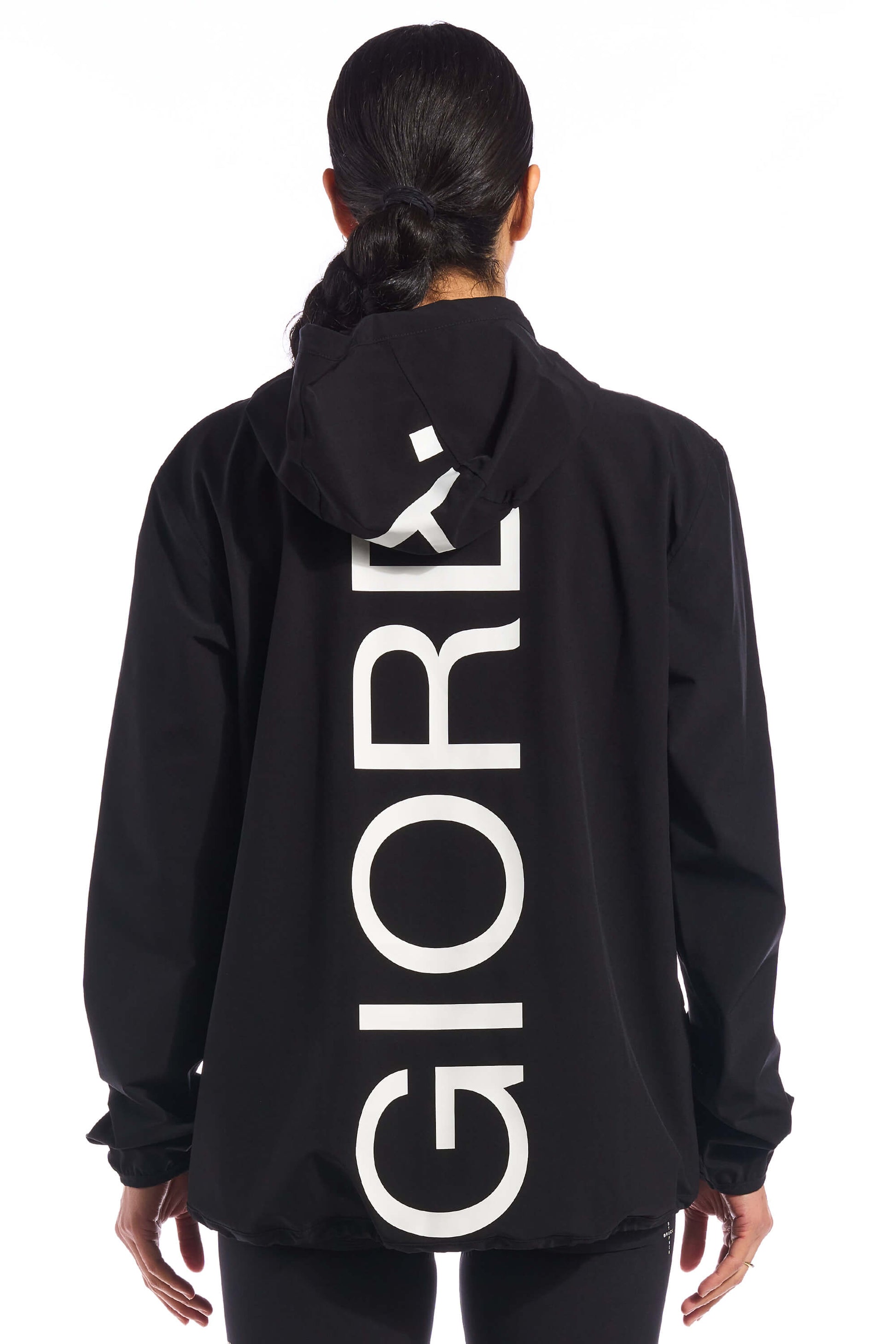 Image showcasing the three-layer waterproof fabric of the Jetty Rain Jacket, providing optimal protection against rain and wind while maintaining a sporty aesthetic, available on Cassiopeia US.