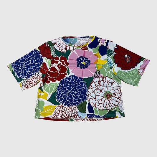 Colorful floral-patterned shirt on a white background