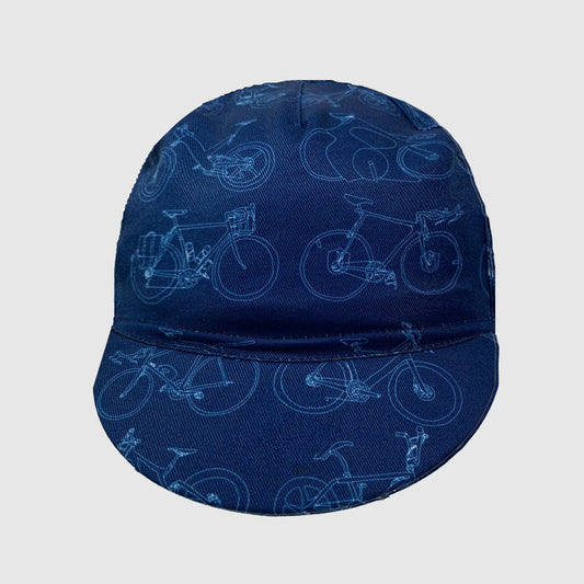 A blue cycling cap with a geometric bike pattern.