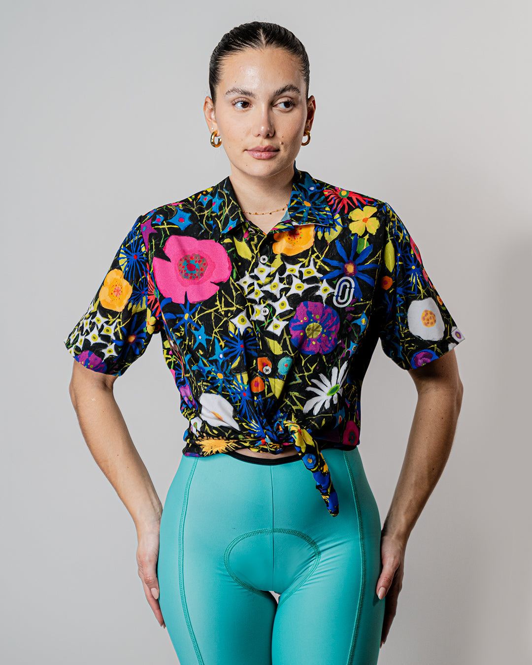 Resort Shirt in Fiori Notturni, inspired by night flowers, featuring vibrant colors on breathable Italian lightweight fabric, available on Cassiopeia US.