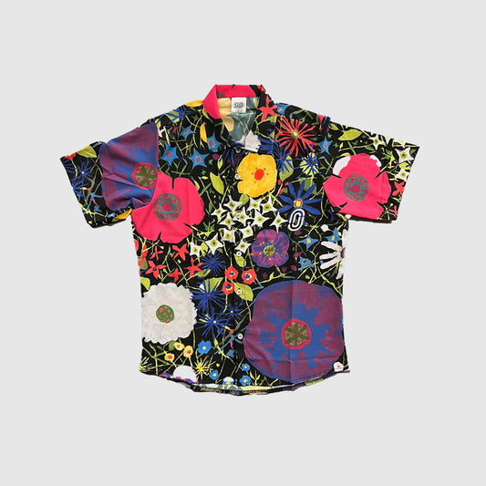 Elegant Fiori Notturni shirt made from finely woven fabric, offering organic softness and breathability for enhanced comfort during summer wear, available on Cassiopeia US.