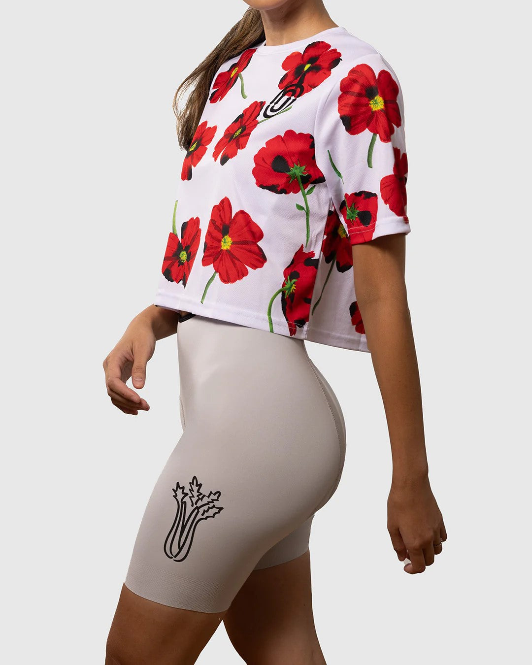 Fashionable red poppy crop top crafted from breathable materials, designed to keep you cool and odor-free.