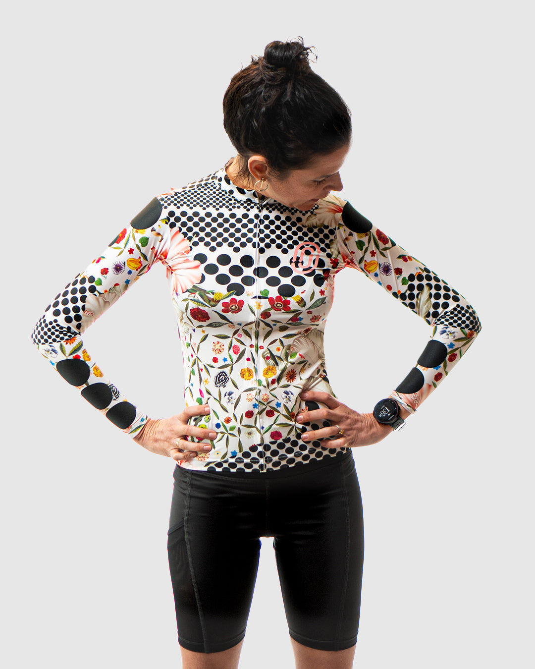 White Omloop jersey showcasing a one-of-a-kind design inspired by medieval architecture and modern technology, ideal for cyclists who appreciate unique style, available on Cassiopeia US.