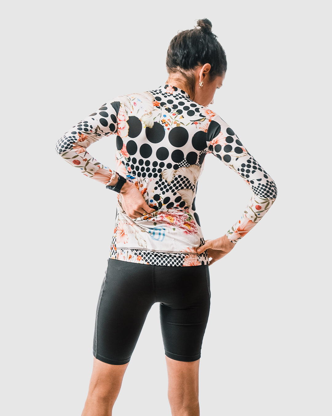 Omloop White jersey designed for cycling enthusiasts, blending artistic inspiration with practical performance features for both on and off the bike, available on Cassiopeia US.