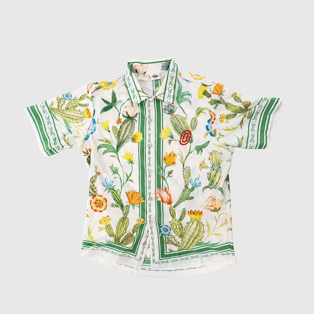 Resort Shirt in Cactus Flower design, inspired by a bike-packing trip to Joshua Tree, crafted from high-end Italian performance fabric, available on Cassiopeia US.