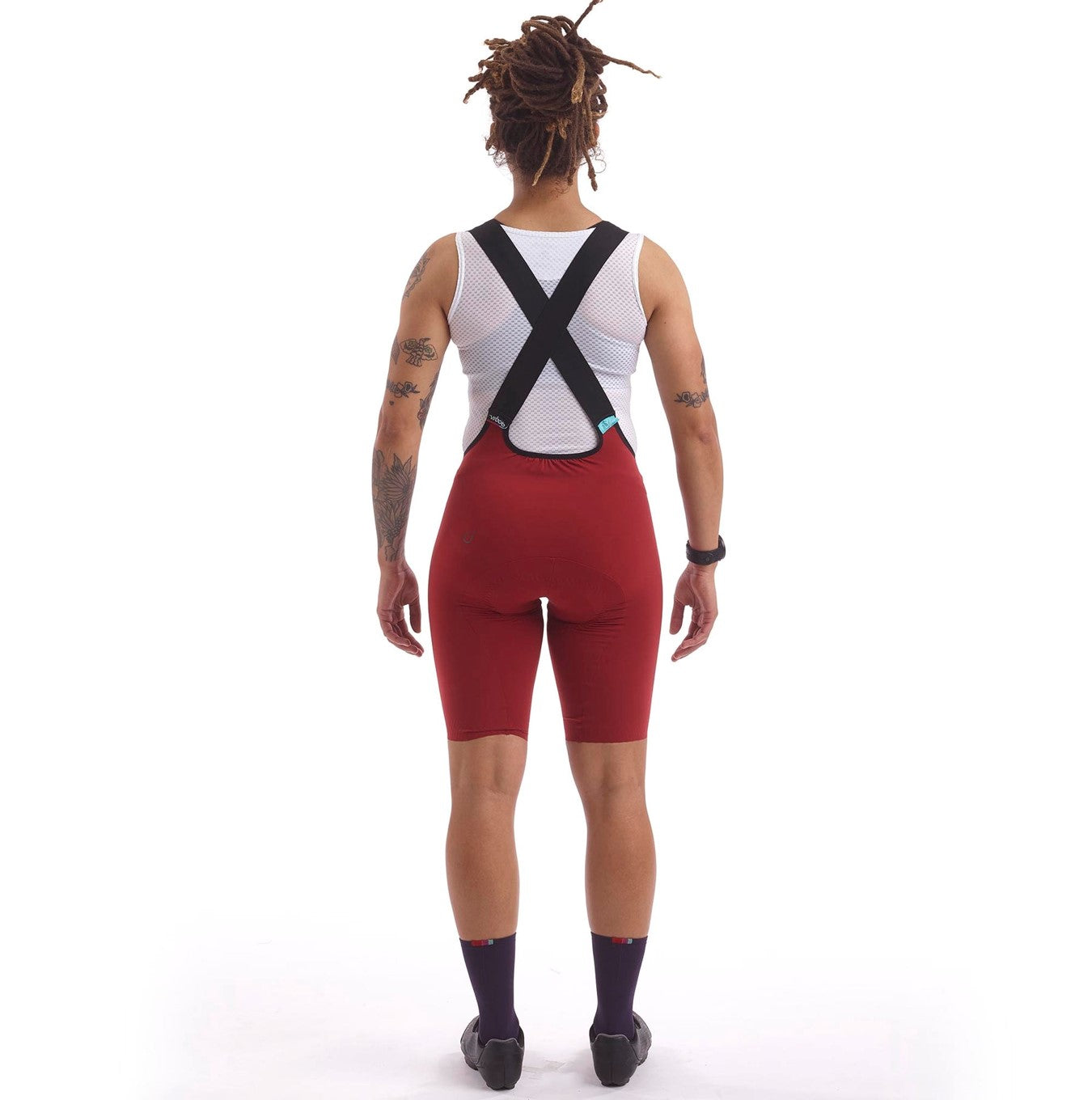 Cassiopeia LUXE Bibs in Oxide Red, offering unmatched comfort and performance for cycling enthusiasts.