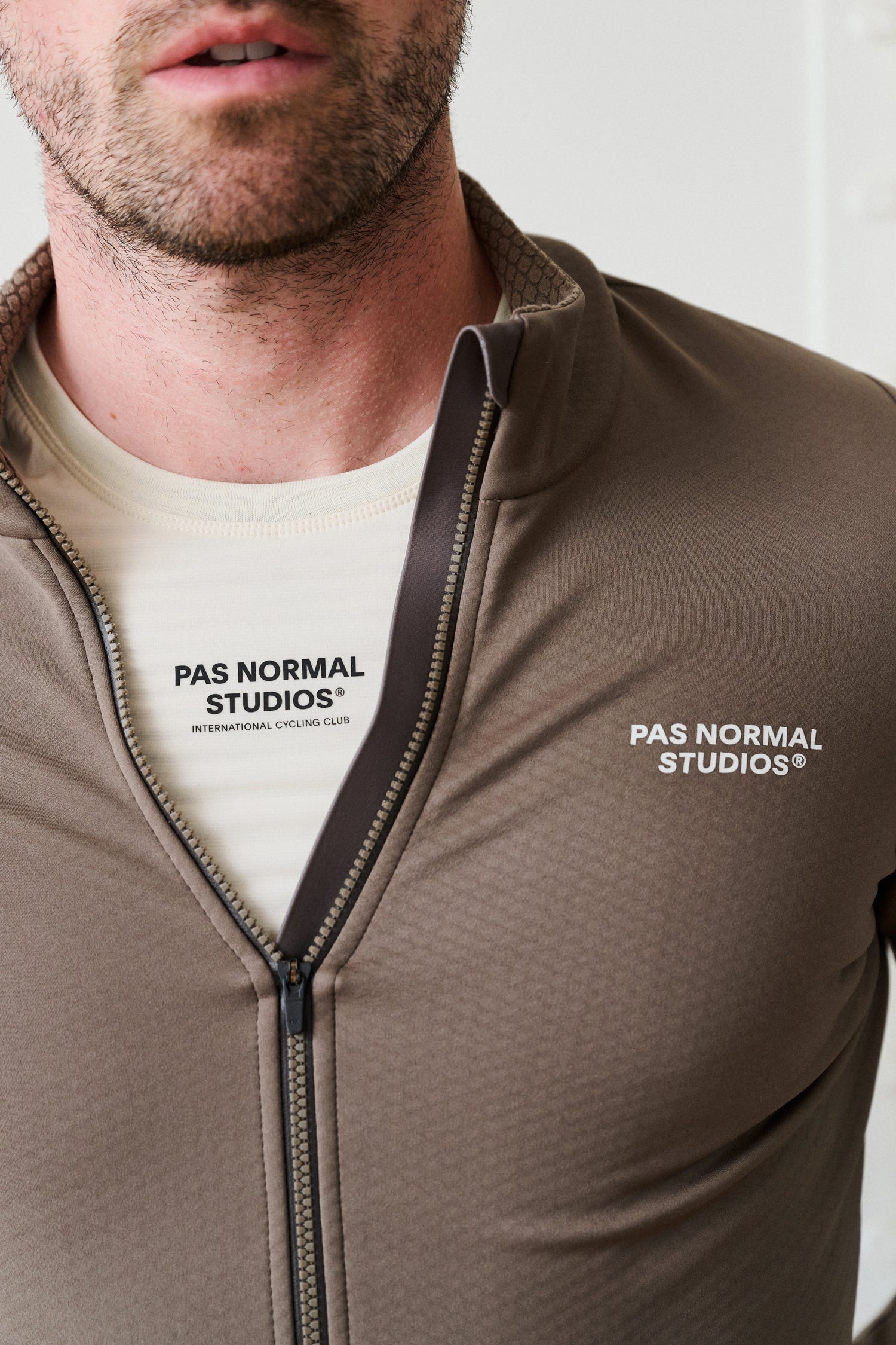PAS NORMAL STUDIO - Close-up of the Essential Thermal Jersey's fleece interior and versatile layering options.