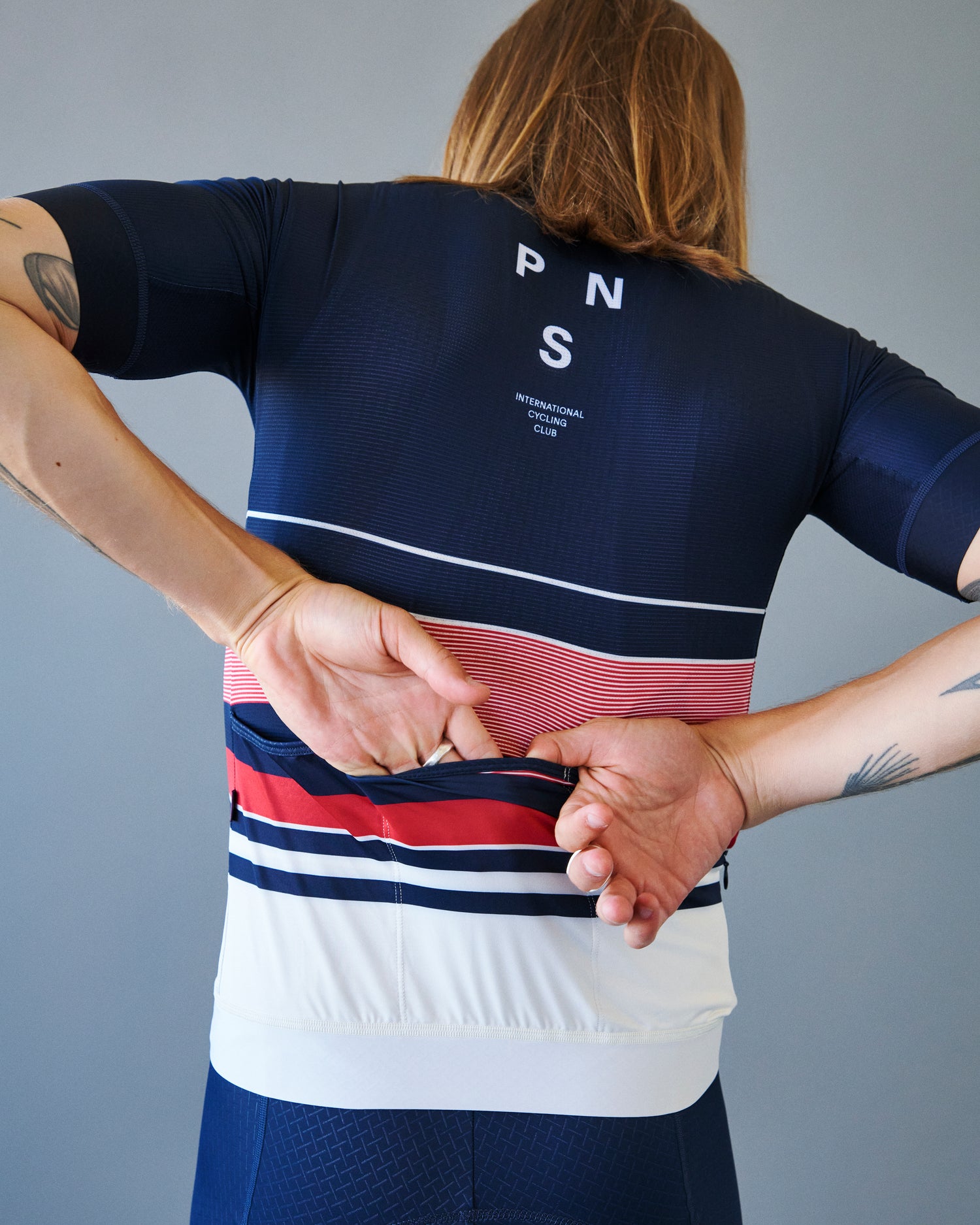 Navy Mechanism Jersey paired with cycling shorts, ideal for competitive or casual rides by PAS NORMAL STUDIOS.