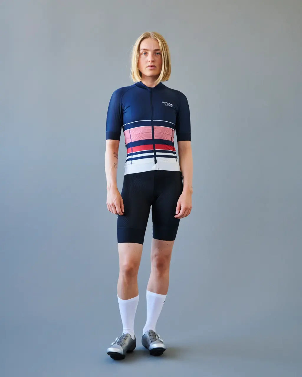 Navy Mechanism Jersey paired with cycling shorts, ideal for competitive or casual rides.