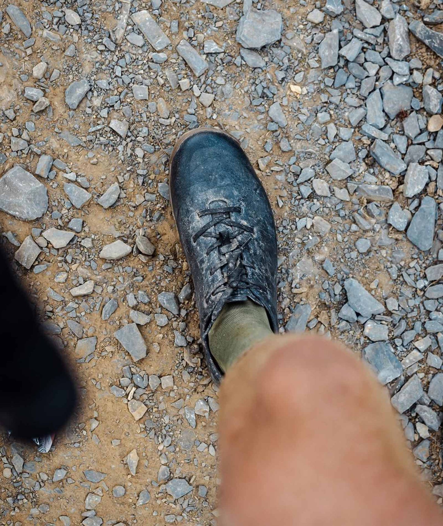 Gran Tourer Lace - Black Gum paired with cycling gear, emphasizing durability and style.