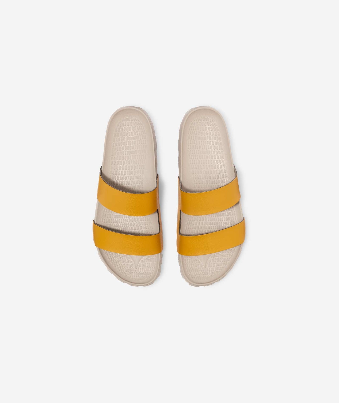 Close-up of the Lala Slide's aeration footbed and premium microfibre straps.