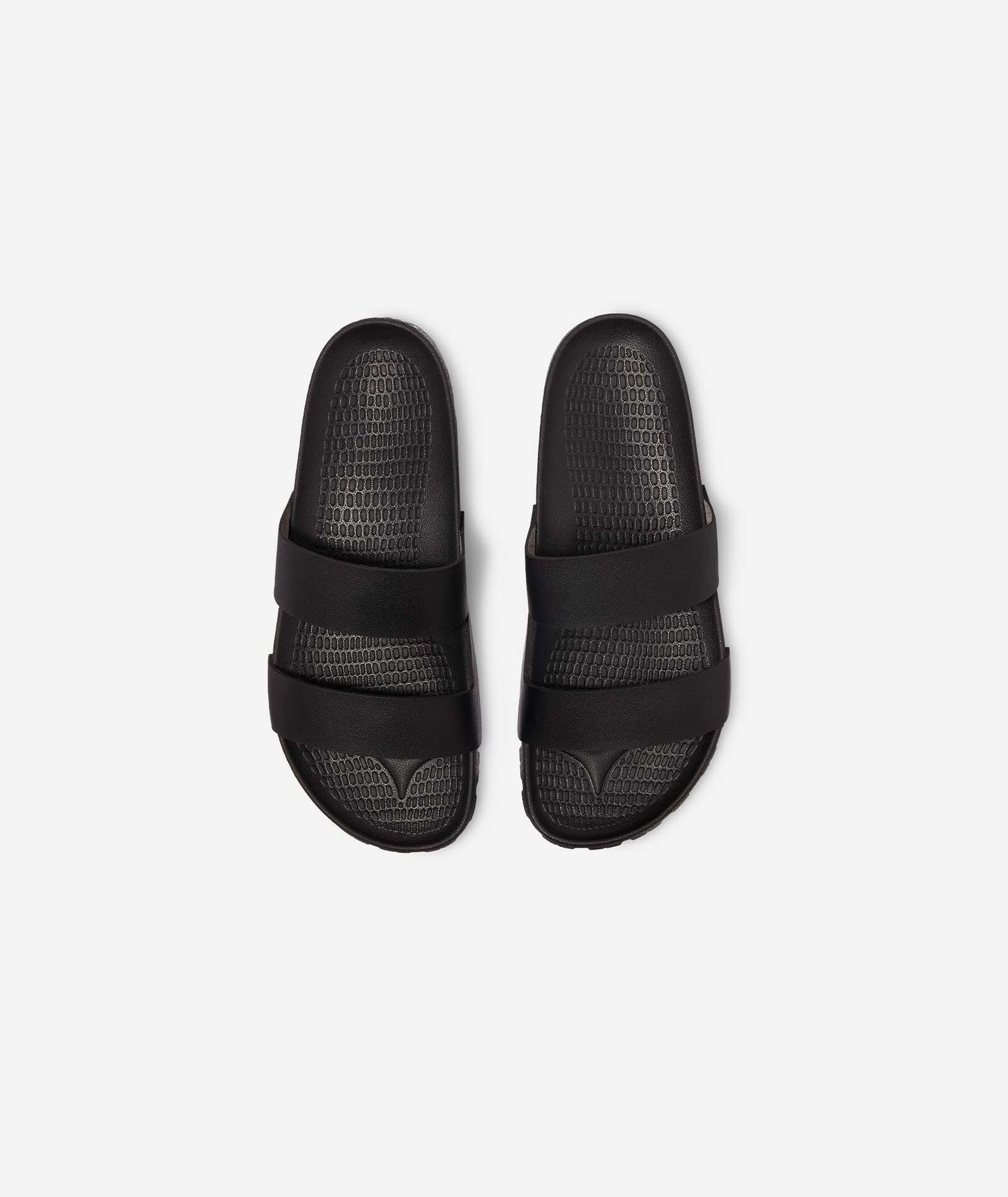 Elegant and practical post-ride slides that combine comfort with sophisticated design for the modern cyclist.