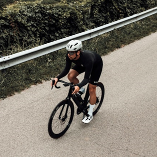 cyclist with Falconer 2Vi Mips Helmet - Bronco White