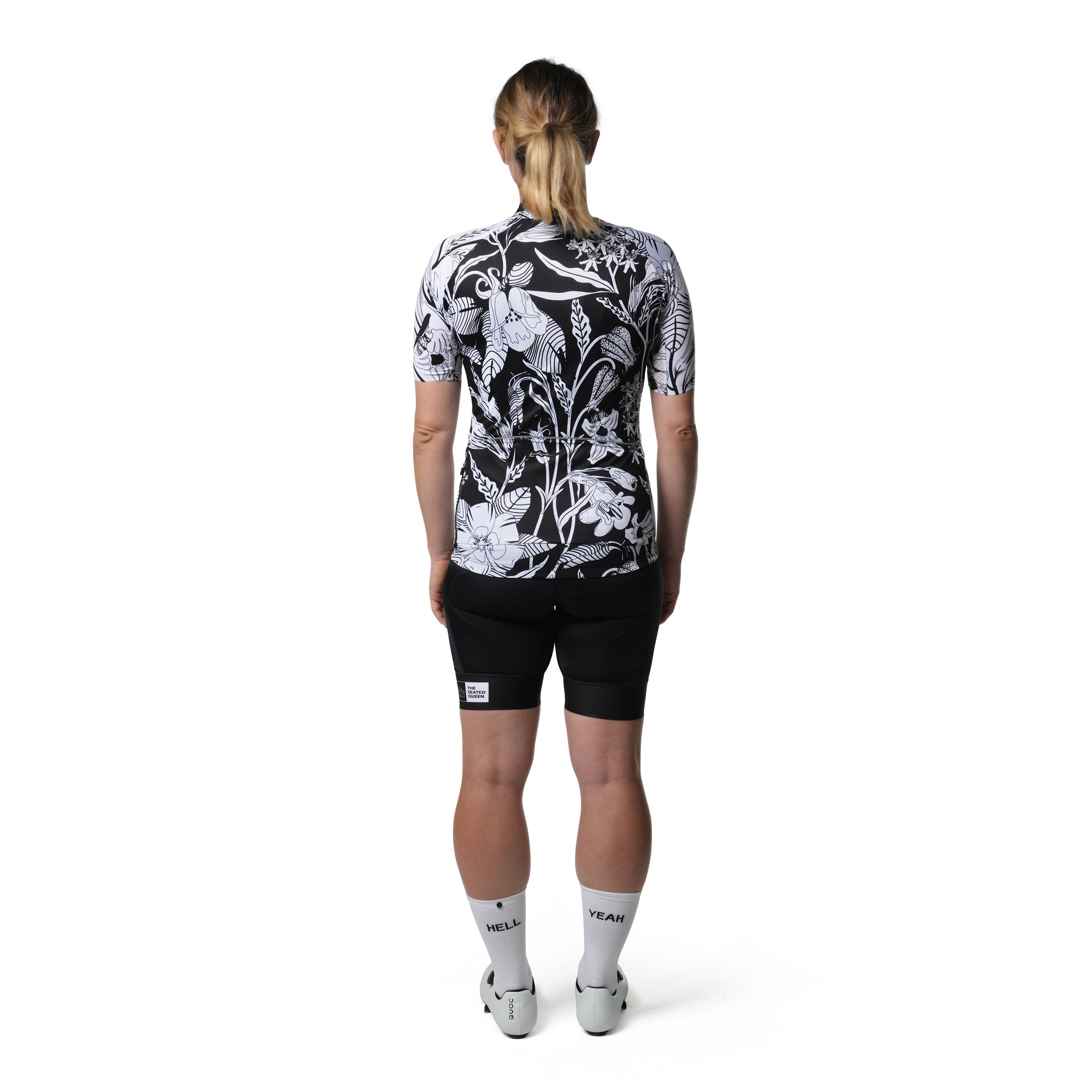 The sleek Cassiopeia Wildflower Aristo Jersey in black & white combines comfort with a sporty aesthetic.