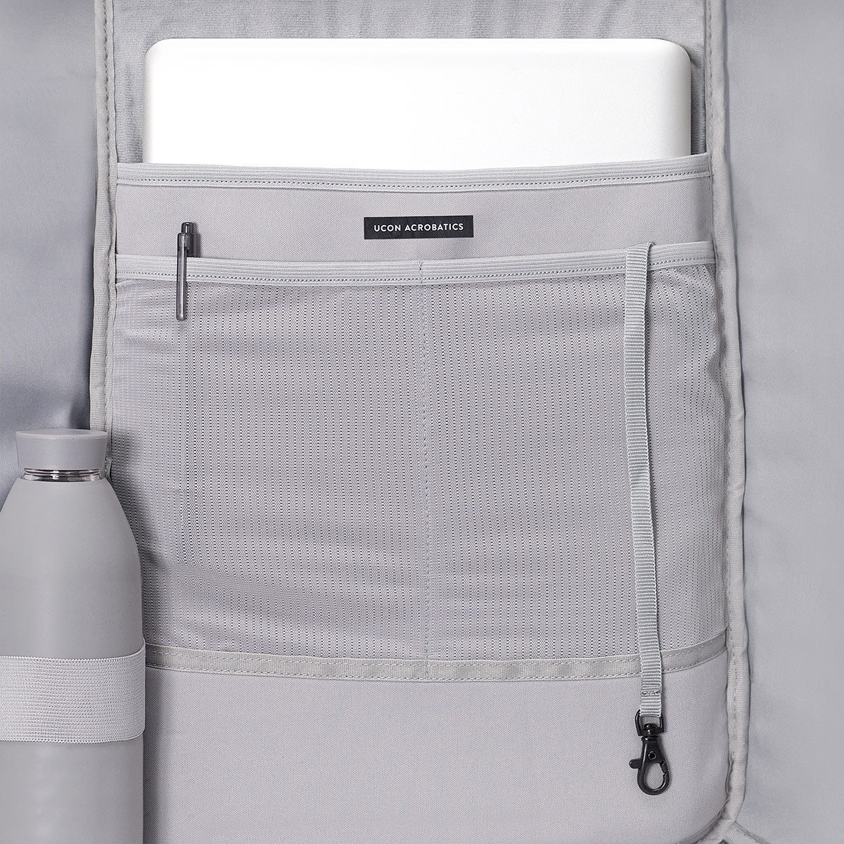 Cassiopeia adaptable roll-top design, secure hook-and-loop closure, daily essentials storage