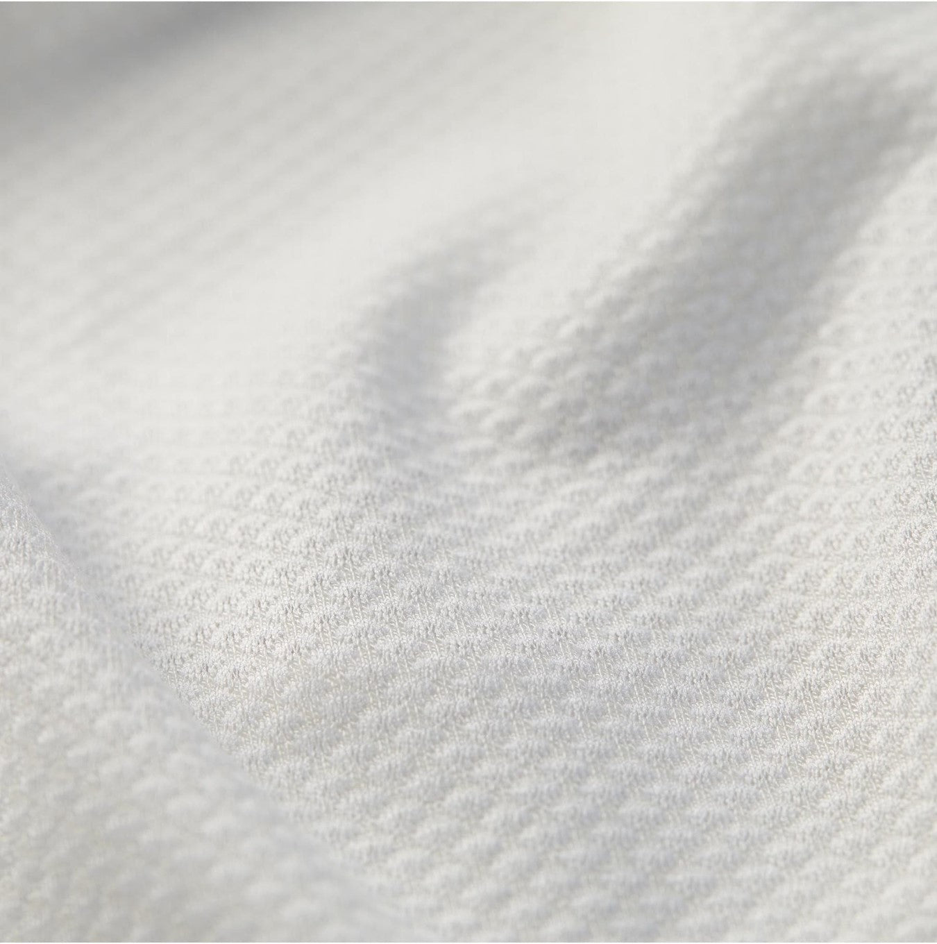 The award-winning Cassiopeia Radiator Mesh Jersey in white is engineered for mid-summer cycling.
