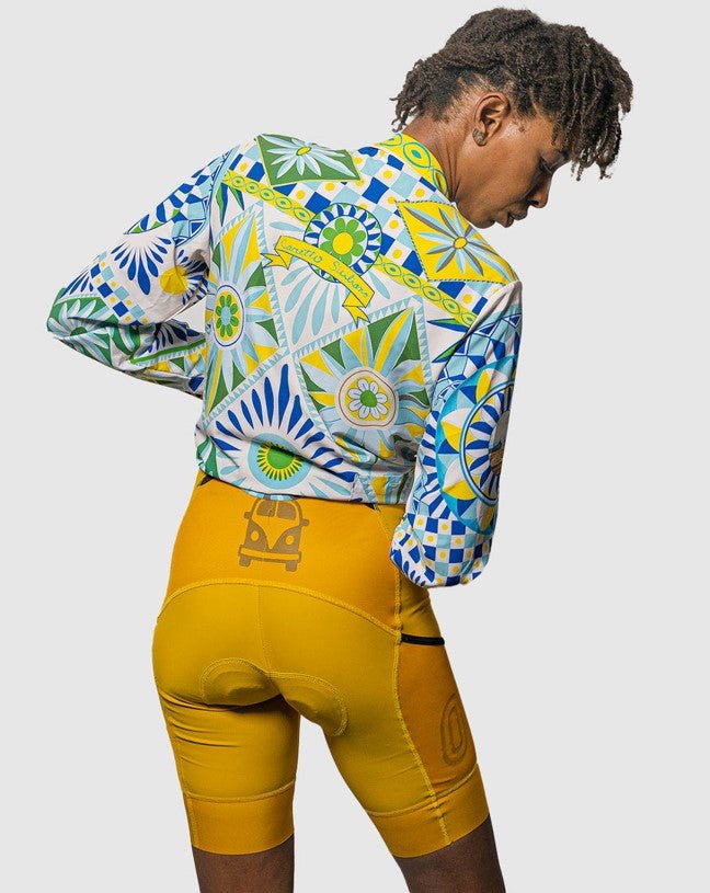 Cassiopeia Curry cycling cargo bibs, breathable fabric, retro camping badge aesthetics