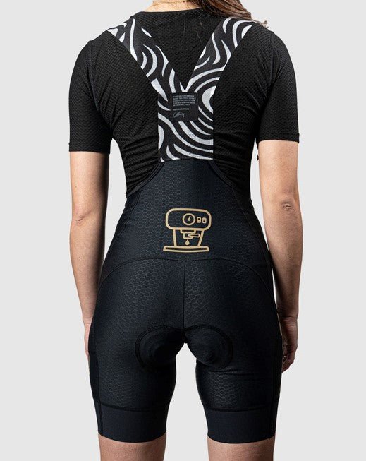 Cassiopeia textured espresso bibs, lay-flat woven straps, retro-reflective heat transfers