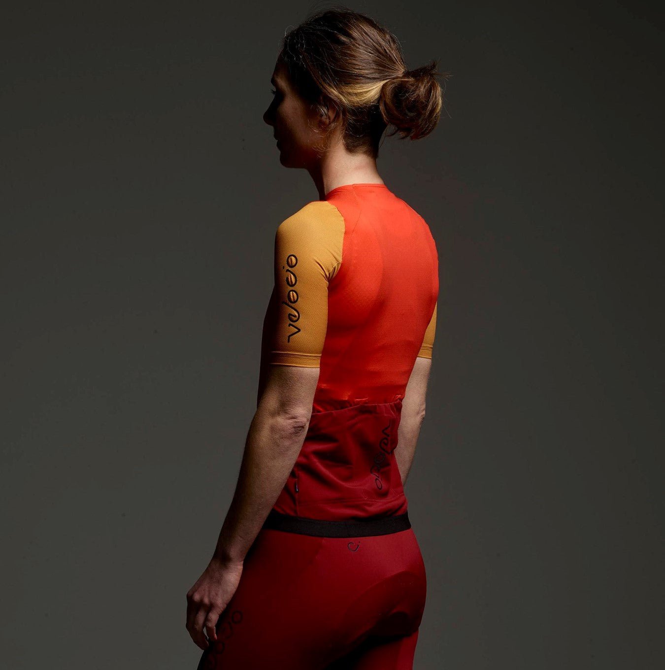 The sleek Cassiopeia Concept SE Jersey in fire red offers a flattering fit for all active cyclists.