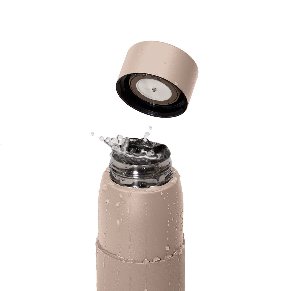 0.5L Premium Bottle akvo water bottle in nude color with water in it. Used by cyclists