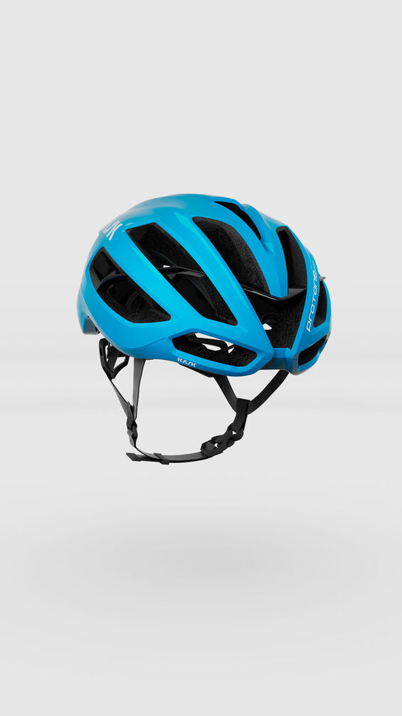 Blue bicycle helmet on a light gray background