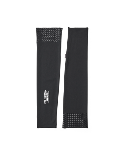 Black arm sleeves with textured ends on a white background