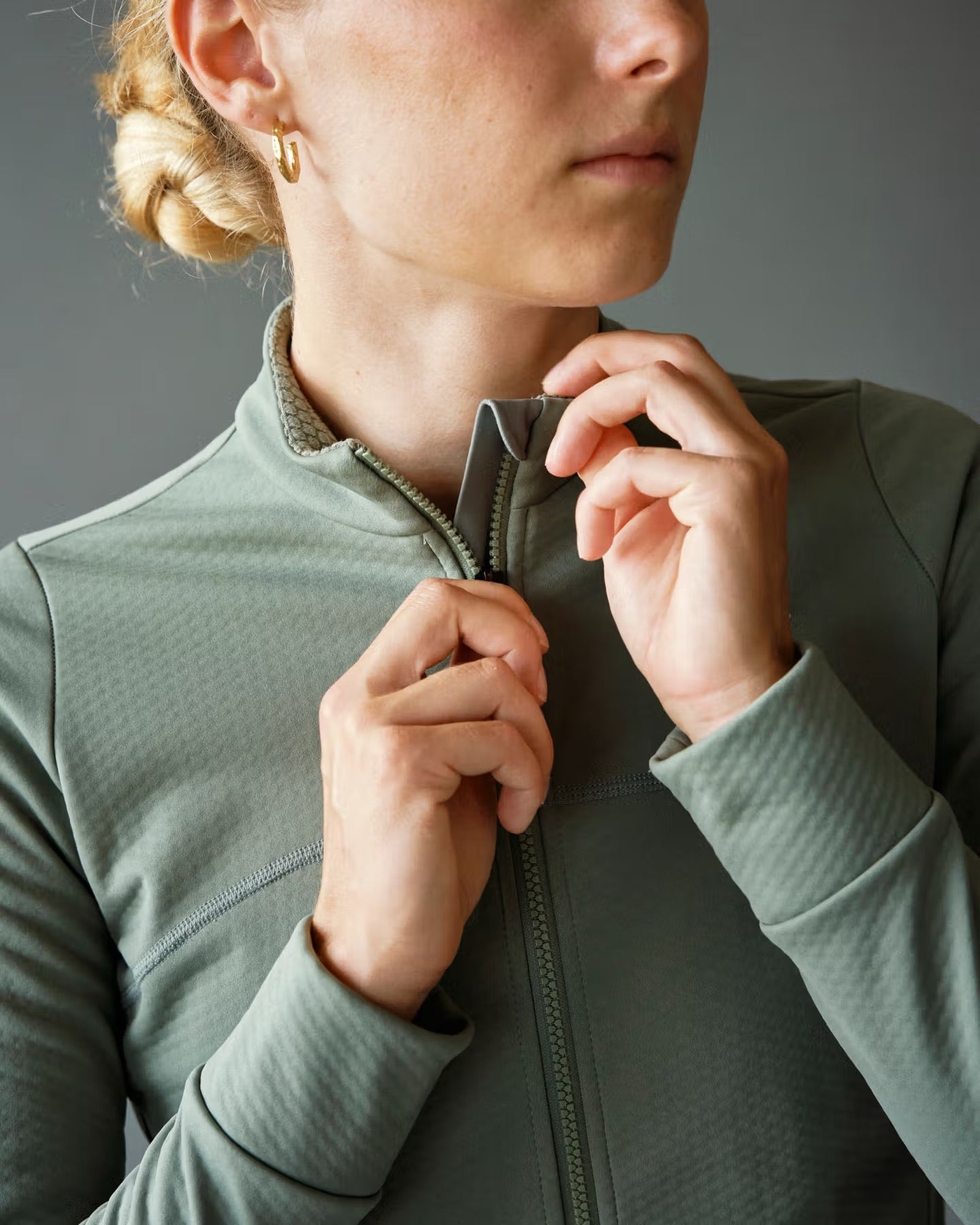 Fashionable Women's Essential Thermal Long Sleeve Jersey showcasing a thermal design and flattering Dark Celeste color, perfect for avid cyclists. Available at Cassiopeia US.