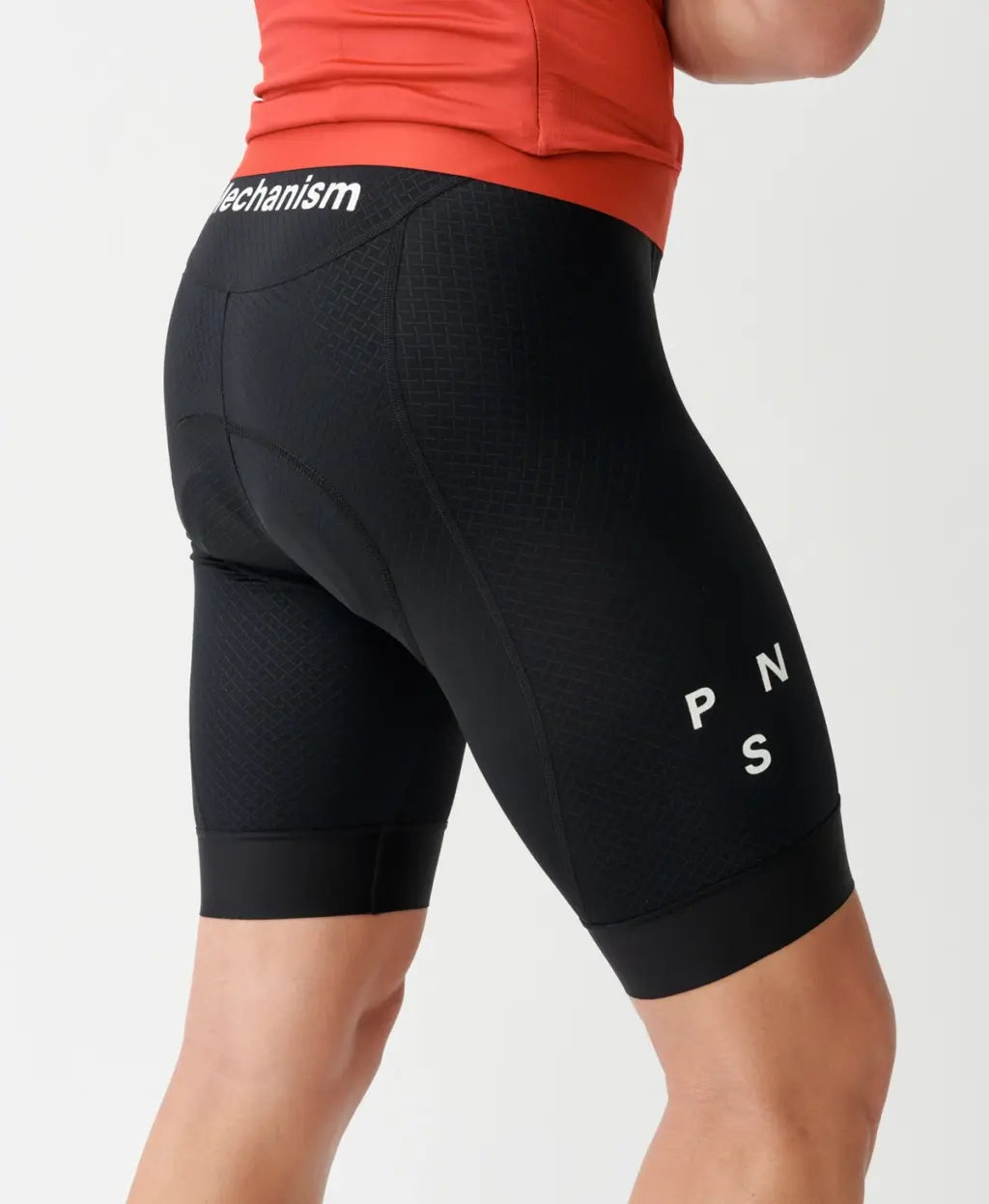 Side view of the PNS Mechanism Bibs - Black, highlighting seamless integration with Mechanism Jerseys.