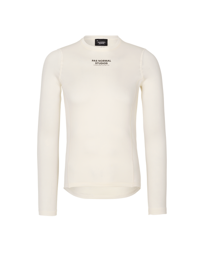 White long-sleeve shirt with 'Pas Normal Studios' logo on a white background