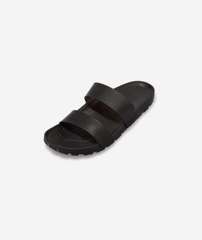 QUOC Black Lala Slide designed for post-ride comfort, combining minimalist elegance with practical utility.
