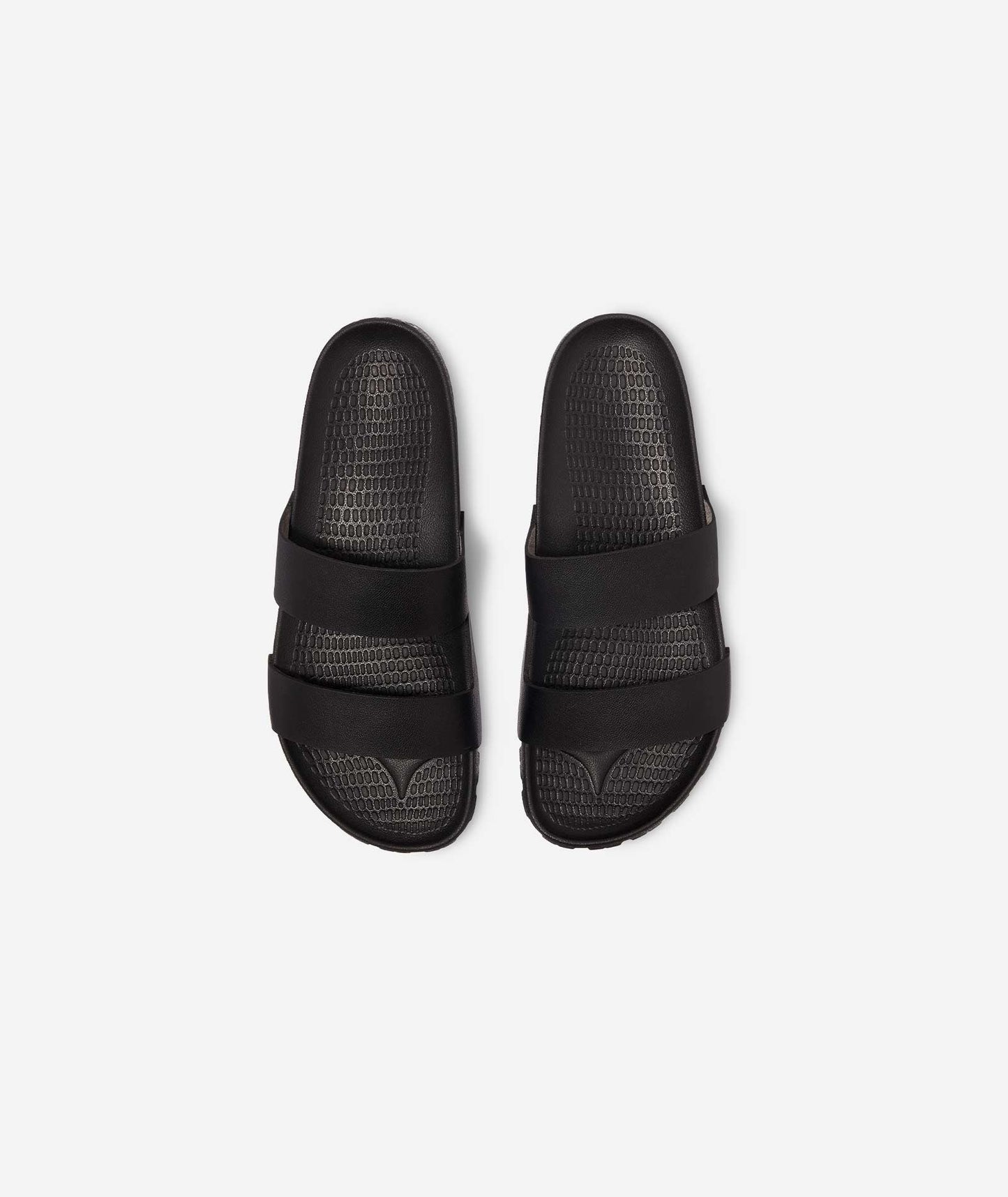 Elegant and practical post-ride slides that combine comfort with sophisticated design for the modern cyclist.
