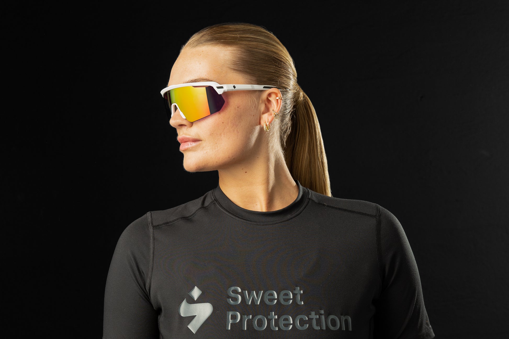 Angled view of Shinobi sunglasses with a lightweight satin white frame for effortless wear.
