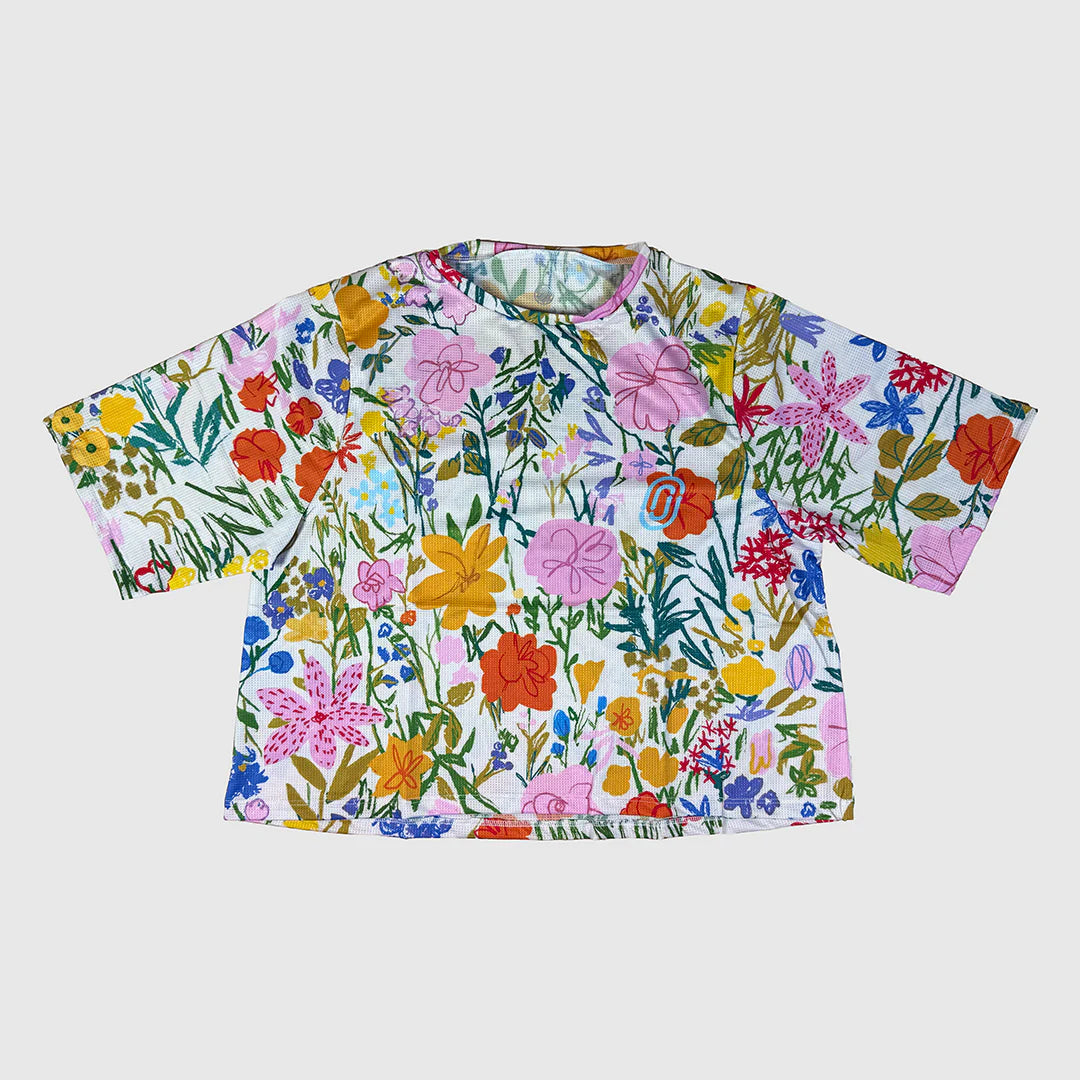 Colorful floral-patterned shirt on a white background