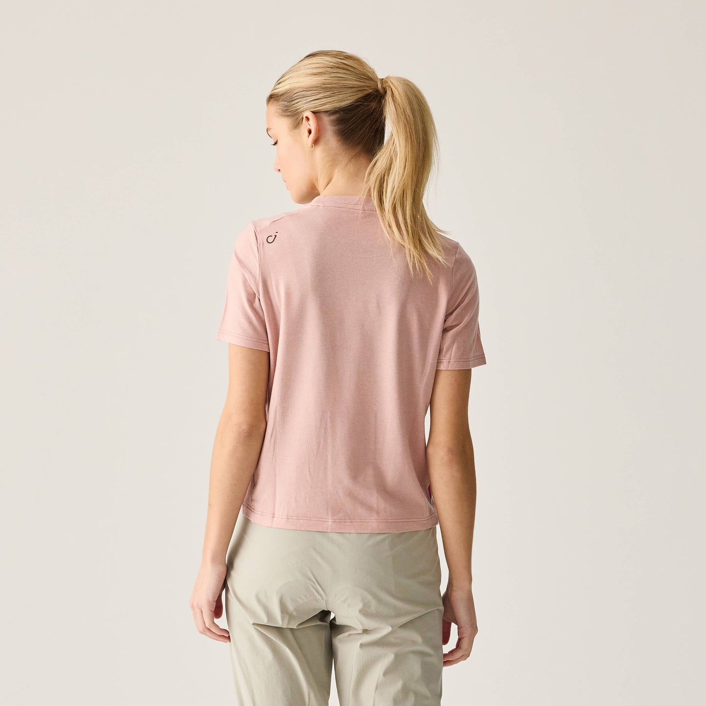 Close-up of Women's Merino Ride Tee fabric texture in Misty Rose