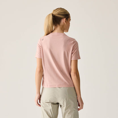 Back view of Women's Merino Ride Tee in soft Misty Rose shade