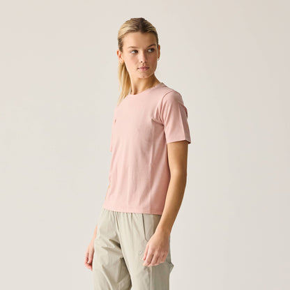 Side profile of Women's Merino Ride Tee - Misty Rose on model